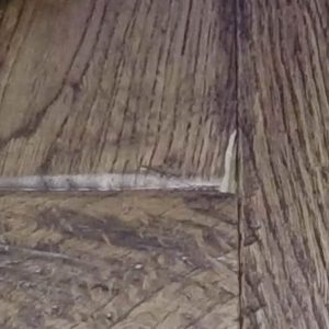 Chipped Wood Floor Edge Before Repair