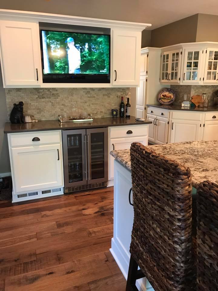 Reclaimed look prefinished solid wood floor from Real Wood Floors in kitchen and dining