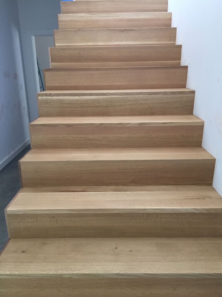 New residential build with white oak floors and stairs