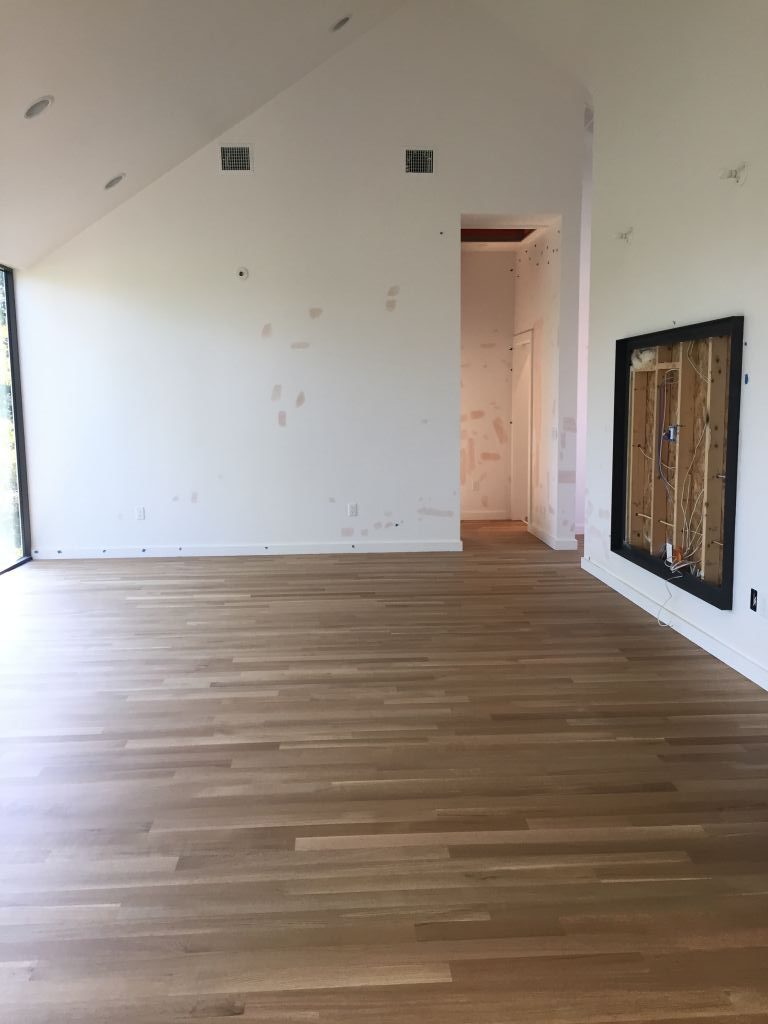 White oak sand and finish install in a new residential build